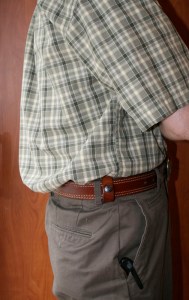 Deep Concealment holster tucked under a shirt.